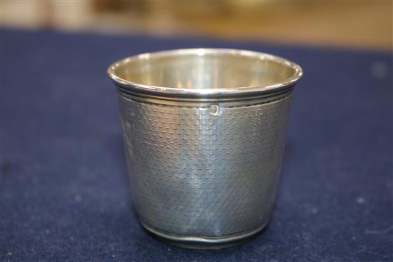 A French Cartier engine turned silver small beaker, 1.9 oz.